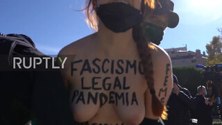 2. Spain: Topless Femen activists arrested after storming Franco rally event *EXPLICIT*
