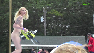 9. Naked girl on stage with chainsaws