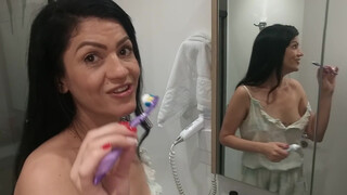 5. Brushing her teeth