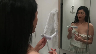2. Brushing her teeth
