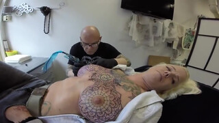 7. Getting Boobs Tatted