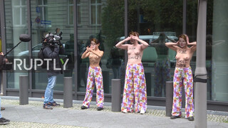 4. Fashion tip for the topless protest: wear pajama bottoms!