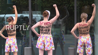 10. Fashion tip for the topless protest: wear pajama bottoms!
