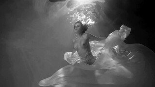 4. Underwater boobs at 0:02 in “Underwater NuArt – Three (18+)”
