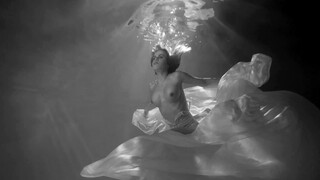 5. Underwater boobs at 0:02 in “Underwater NuArt – Three (18+)”