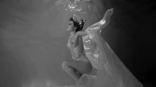7. Underwater boobs at 0:02 in “Underwater NuArt – Three (18+)”