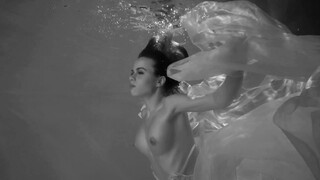 2. Underwater boobs at 0:02 in “Underwater NuArt – Three (18+)”