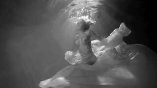 3. Underwater boobs at 0:02 in “Underwater NuArt – Three (18+)”