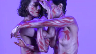 2. Two models in body paint caress each other at 0:05 in “LOVE is LOVE…Body Painting Teri & Shanna”