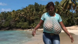 6. Topless model with HUGE boobs, running on the beach at 2:28 in “Dominican glamor model, Feminist activist Mio.Supporting FreeTheNipple movement on a Caribbean beach”