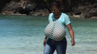 1. Topless model with HUGE boobs, running on the beach at 2:28 in “Dominican glamor model, Feminist activist Mio.Supporting FreeTheNipple movement on a Caribbean beach”