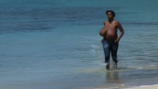 10. Topless model with HUGE boobs, running on the beach at 2:28 in “Dominican glamor model, Feminist activist Mio.Supporting FreeTheNipple movement on a Caribbean beach”