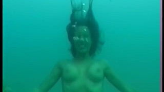 9. Topless female divers