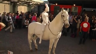 5. Naked white bunny-girl rides a white horse in “L’Anno Del Coniglio Bianco. By Franco Losvizzero 2011-Performance. Macro Museum”