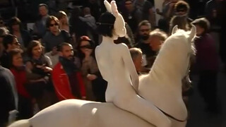 6. Naked white bunny-girl rides a white horse in “L’Anno Del Coniglio Bianco. By Franco Losvizzero 2011-Performance. Macro Museum”