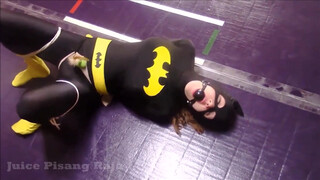 8. Batgirl is tied up and strapped to a vibrator in “Recent Bondage Latek Girl Orgasm On Catsuit”
