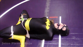 2. Batgirl is tied up and strapped to a vibrator in “Recent Bondage Latek Girl Orgasm On Catsuit”