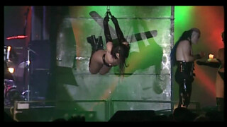 3. [WARNING: STRONG BDSM SCENE] Needle play and fire play on a girl’s naked butt at 1:30 in “Umbra Et Imago — Viva Lesbian Show – (11/16) – [Die Welt Brennt Live Concert DVD]”
