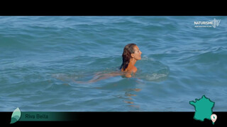 5. French woman skinny dipping in ocean