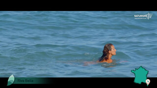 10. French woman skinny dipping in ocean