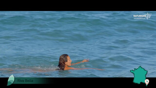 2. French woman skinny dipping in ocean