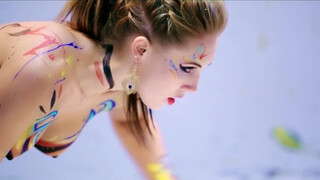 8. topless bodypainted girl dancing