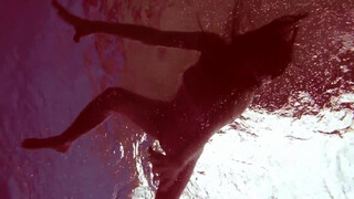 4. swimming girl under water, flashes on time stamp and at 55 seconds