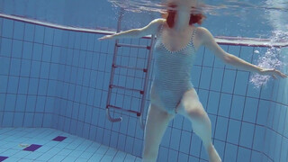 10. swimming girl under water, flashes on time stamp and at 55 seconds