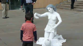 6. Topless living statue in Bogota, Colombia