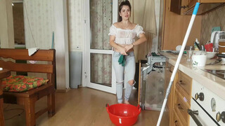 1. Cleaning the floor in a wet T-Shirt