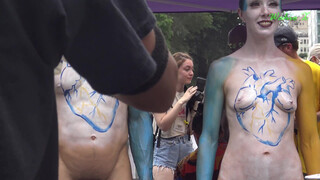 8. Pussy and penis visible for extended scene starting around 1:30 in “Body Painting Day 2021, New York City – Part 3”