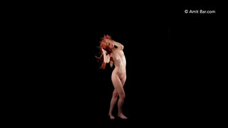 1. Redhead dances naked at 0:05 in new upload “Art video: Ameria dancing by Amit Bar”