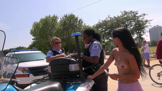 5. Topless Woman Ticketed At GoTopless Day Rally in Chicago