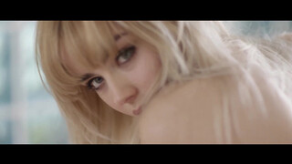 Taking off a see-through bra at 3:25 in “Danielle Sharp | May Contain Girl Photoshoot video”