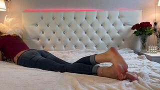 5. Bare feet & long legs in bed, very short top