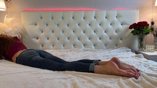 7. Bare feet & long legs in bed, very short top
