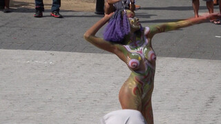 8. Thin bodypainted girl shows off her naked body in public