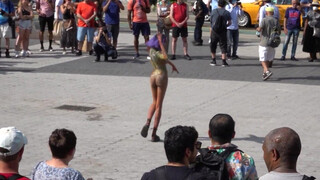 9. Thin bodypainted girl shows off her naked body in public