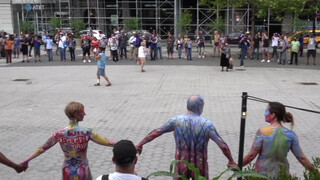 2. Thin bodypainted girl shows off her naked body in public