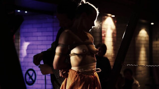 3. Man ties up topless woman in “Club X~31.01.15~ Glasgow”