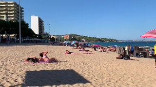 2. Spain beach topless at 1:47 to 1:59