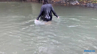 2. Wetlook girl get wet in mountain stream in skirt and tights