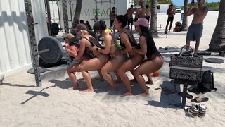 fit girl exercize at Miami beach thigh and bottom at 0:31