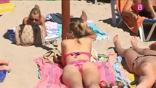 9. Beach titties, then another young perky titties girl giving an interview on the beach.