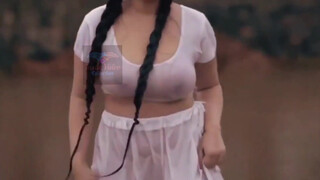 Enjoying in wet transparent dress