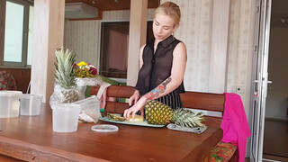 3. Pineapple cutting in transparent shirt