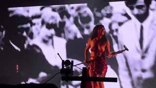 8. Spanish rock singer Eva Amaral performs topless (0:34)