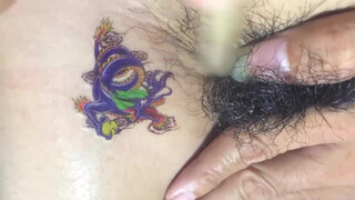 5. Temporary tattoo above an thick bush