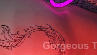 8. Bare ass visible while putting on a temporary tatoo on a butt cheek