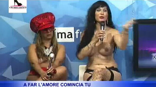 8. 2:06 is one of a couple nice stripteases in UNLISTED video “A Far l’amore comincia Tu 3 PUNTATA N.1”